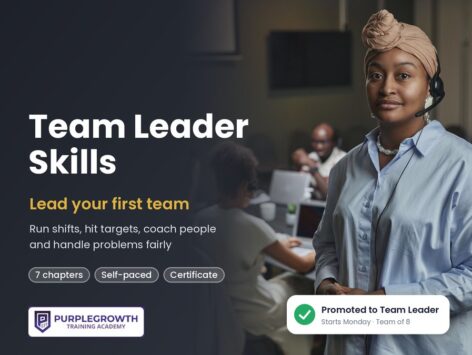 Team Leader Skills course: a team leader with a headset standing in front of her call centre team