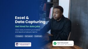 Excel and Data Capturing course: a young man typing at a laptop in an office